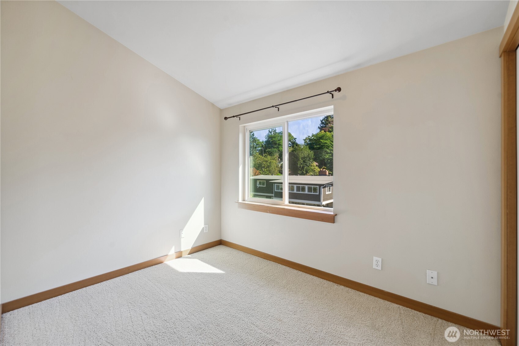 9228 15th Avenue Southwest, Unit B Seattle, WA 98106 - Photo 13 of 16 a view of an empty room with a window