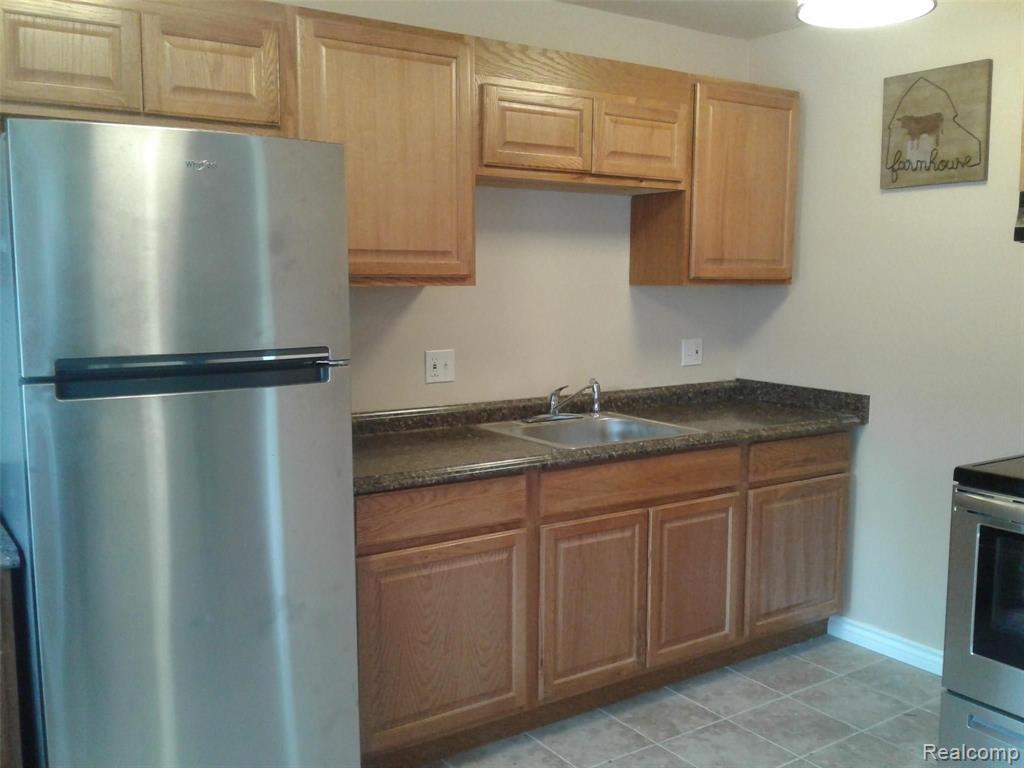 5200 23 Mile Road, Unit 4 Utica, MI 48316 - Photo 2 of 13