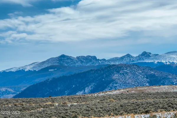 a view of an outdoor space and a mountain view