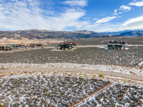 a view of a road with an ocean