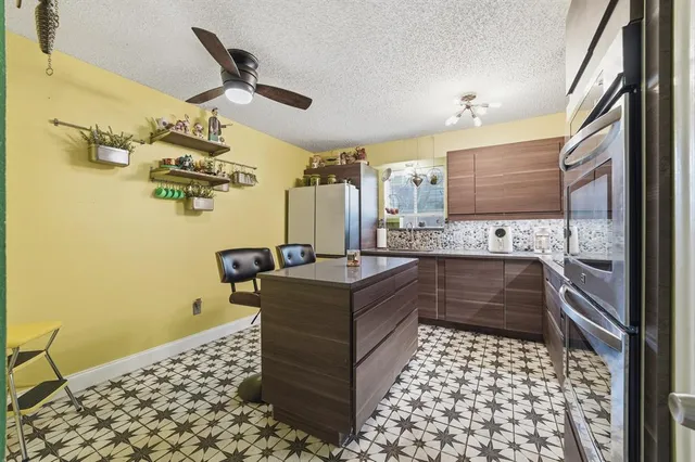 a bathroom with a bathtub sink and mirror