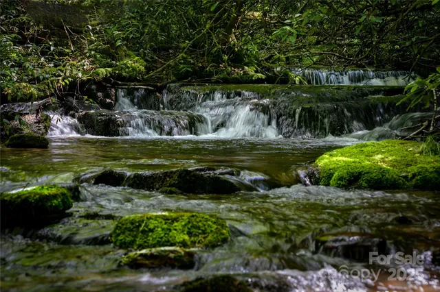 a view of a golf course with green space