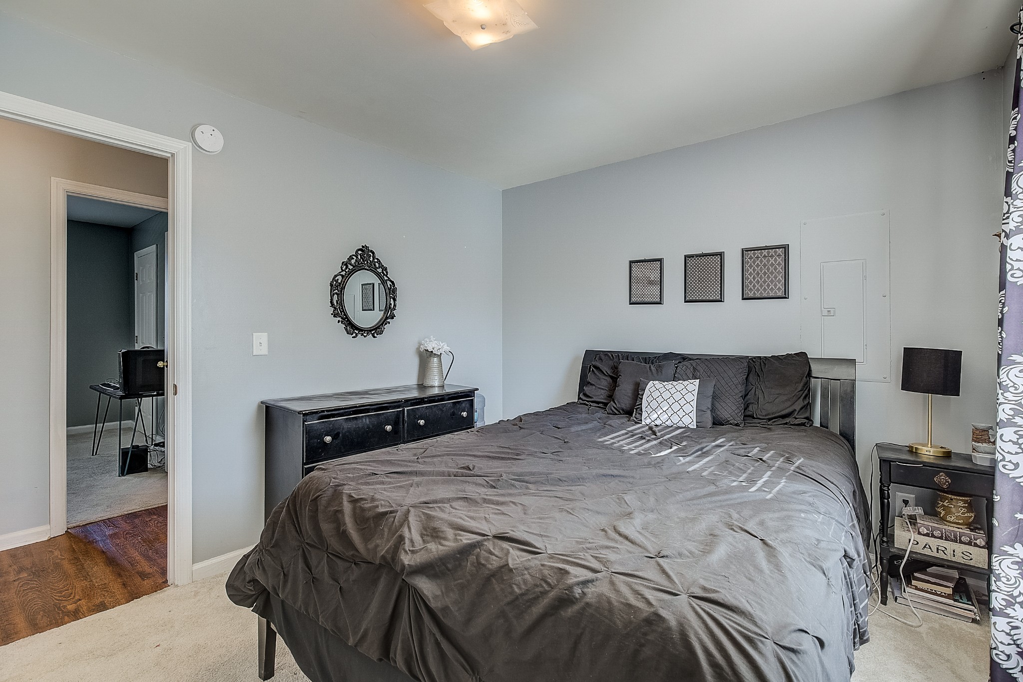 2404 Spring Ln Spring Hill Spring Hill, TN 37174 - Photo 15 of 26 a bedroom with a bed and wooden floor