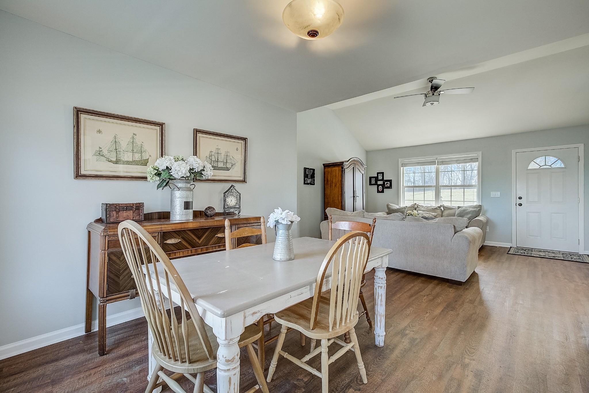 2404 Spring Ln Spring Hill Spring Hill, TN 37174 - Photo 9 of 26 a view of a dining room with furniture and wooden floor