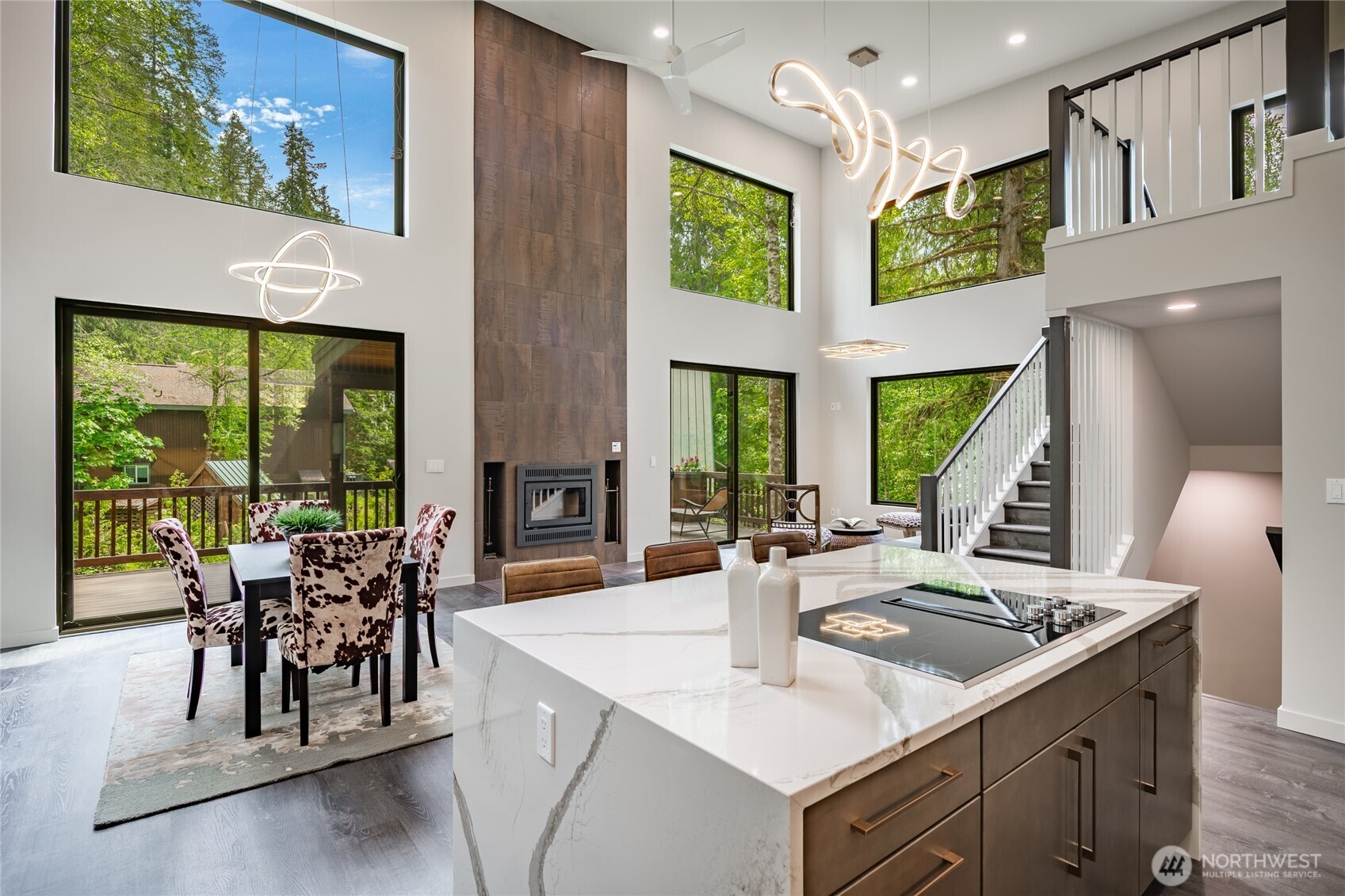 12031 Shuksan Rim Drive Deming, WA 98244 - Photo 12 of 39 a view of a dining room with furniture window and outside view