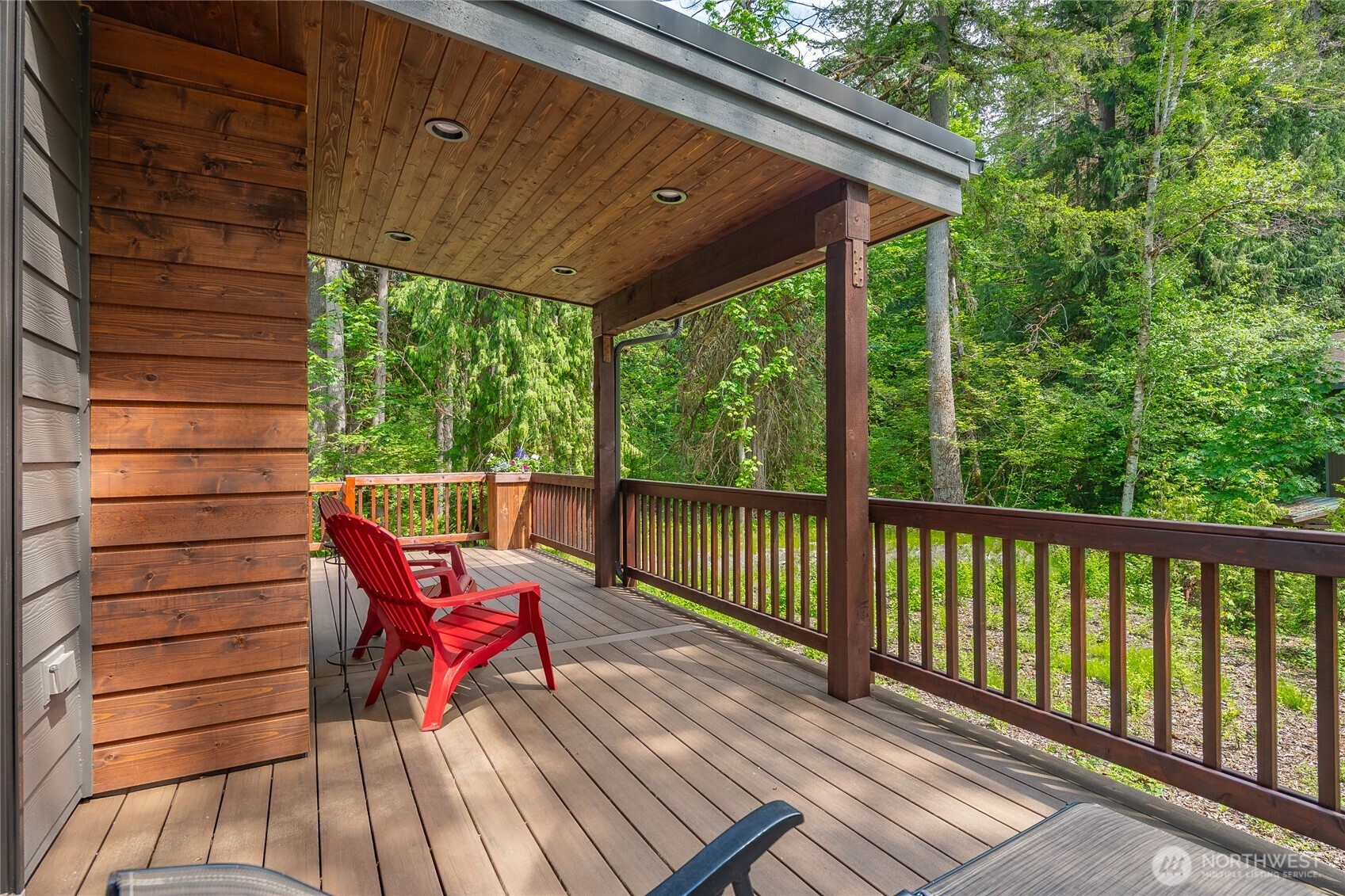 12031 Shuksan Rim Drive Deming, WA 98244 - Photo 17 of 39 a view of a two chairs in the balcony