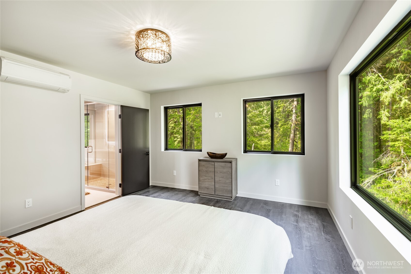 12031 Shuksan Rim Drive Deming, WA 98244 - Photo 20 of 39 a bedroom with a bed and a window