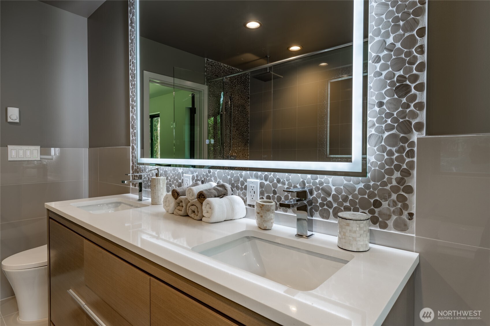 12031 Shuksan Rim Drive Deming, WA 98244 - Photo 24 of 39 a bathroom with a sink and a mirror