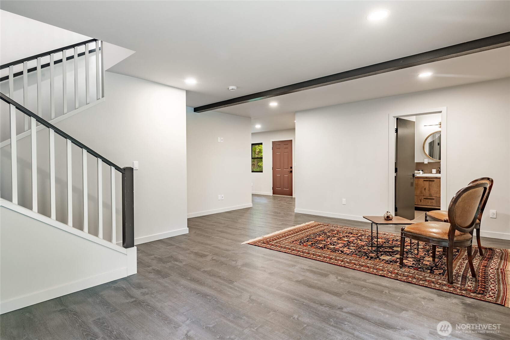 12031 Shuksan Rim Drive Deming, WA 98244 - Photo 30 of 39 a view of a hallway with furniture and staircase