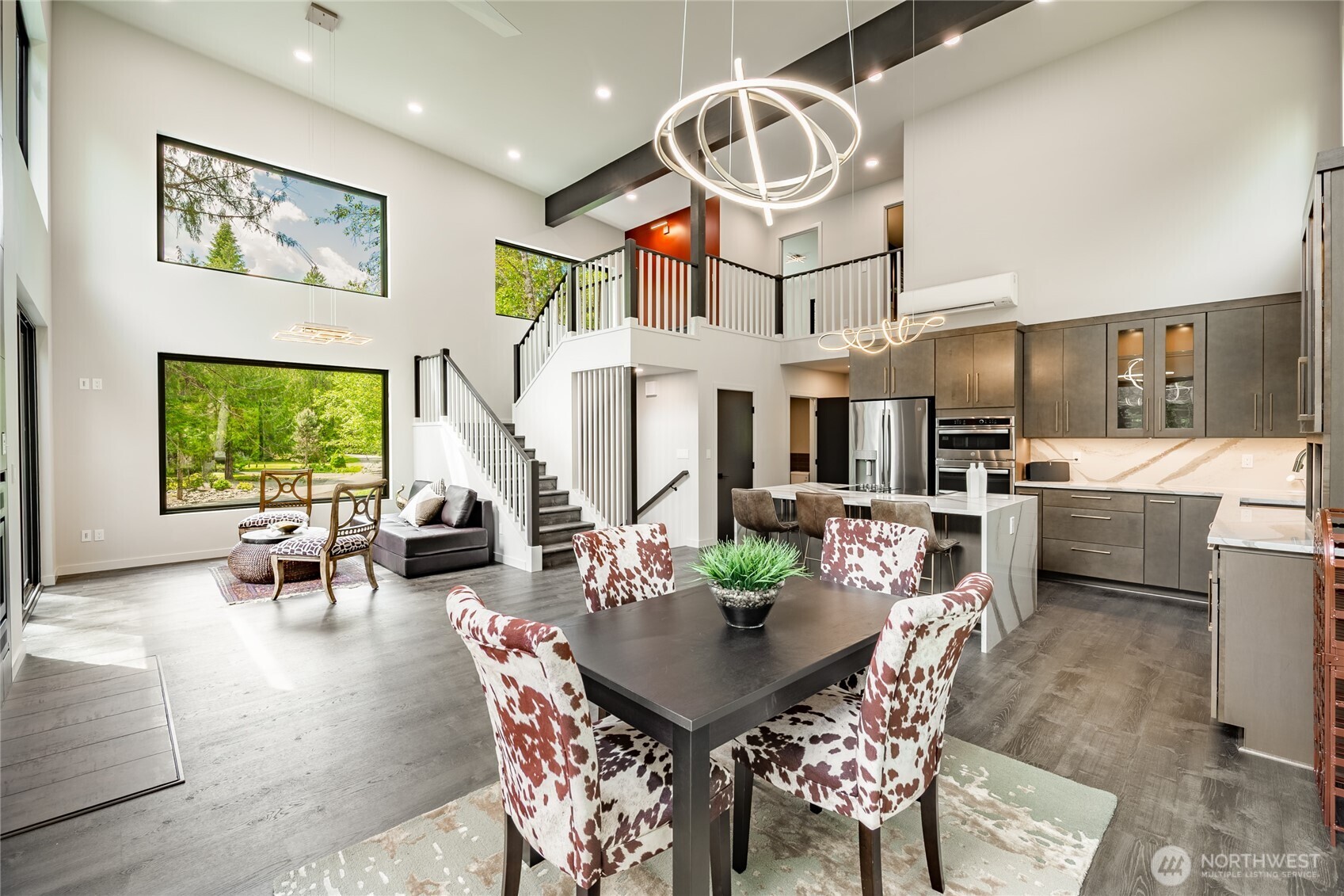 12031 Shuksan Rim Drive Deming, WA 98244 - Photo 3 of 39 a view of a dining room with furniture window and outside view