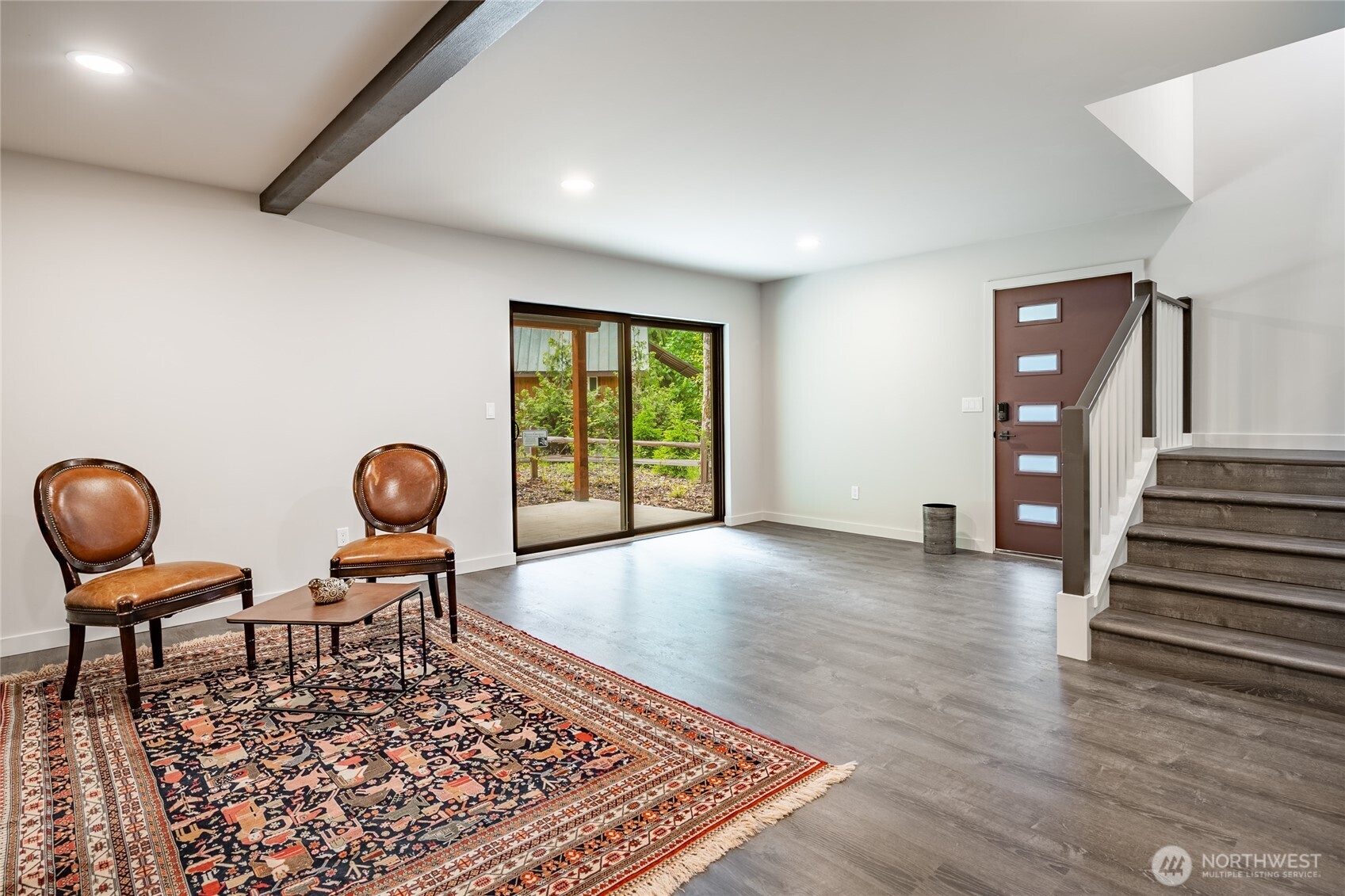 12031 Shuksan Rim Drive Deming, WA 98244 - Photo 31 of 39 a living room with furniture and a chair