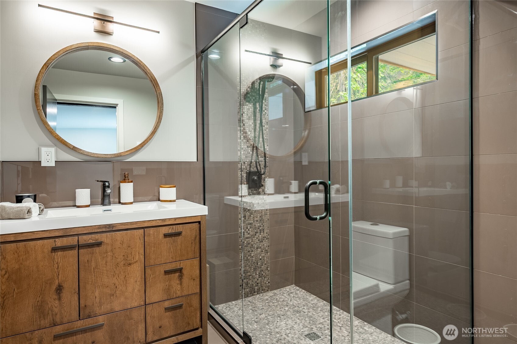 12031 Shuksan Rim Drive Deming, WA 98244 - Photo 33 of 39 a bathroom with a sink mirror and toilet
