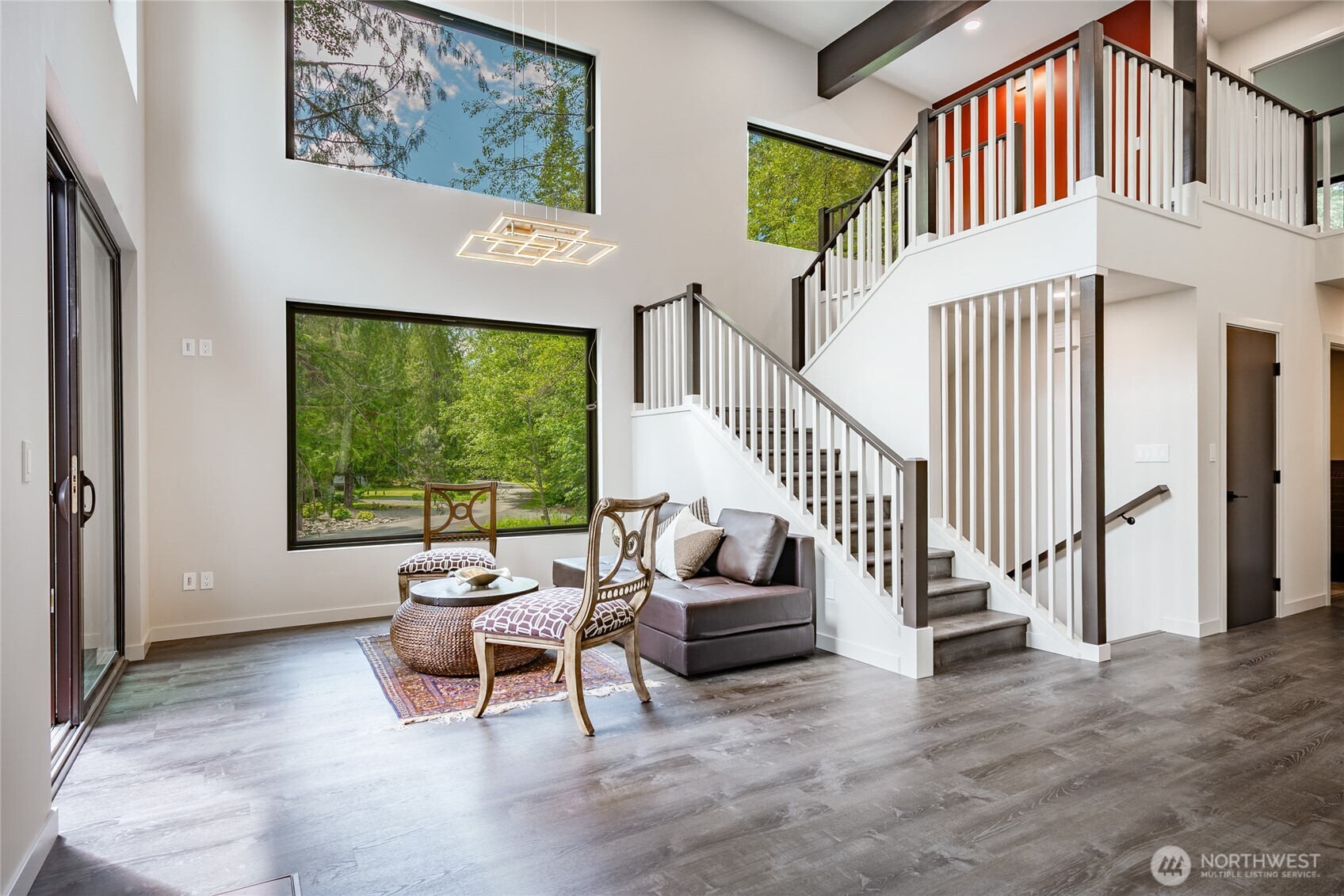12031 Shuksan Rim Drive Deming, WA 98244 - Photo 7 of 39 a living room with furniture and a flat screen tv