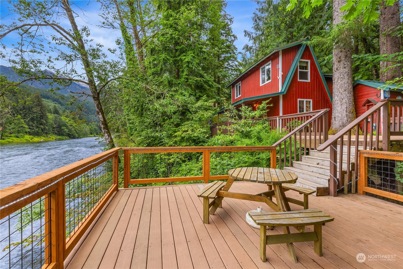 51917 South Riverside Road Gold Bar, WA 98251 - Photo 2 of 19 a view of a two chairs on the roof deck
