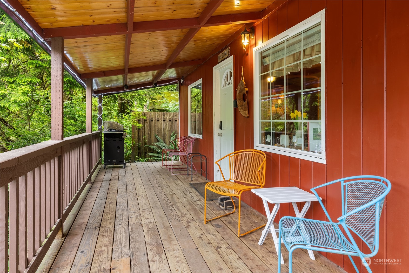 51917 South Riverside Road Gold Bar, WA 98251 - Photo 5 of 19 a view of a chairs and table in the balcony