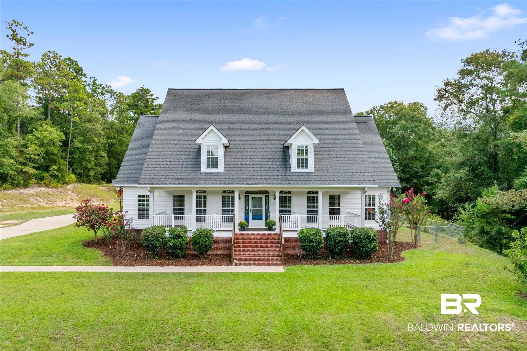 72 Limestone Drive Jackson, AL 36545 - Photo 1 of 38 Cape cod house with a front yard and covered porch