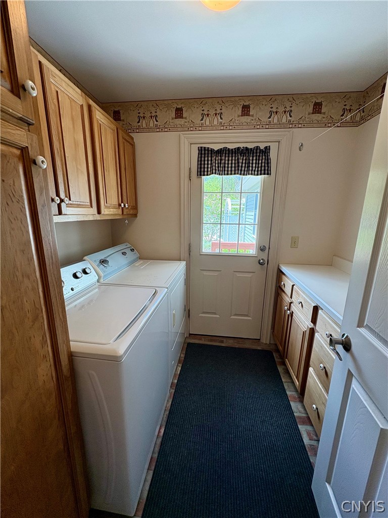 7892 East Ridge Pointe Drive Manlius, NY 13066 - Photo 24 of 46 Main floor laundry room with extra storage.