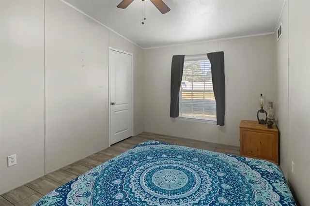 a bathroom with a granite countertop sink and mirror