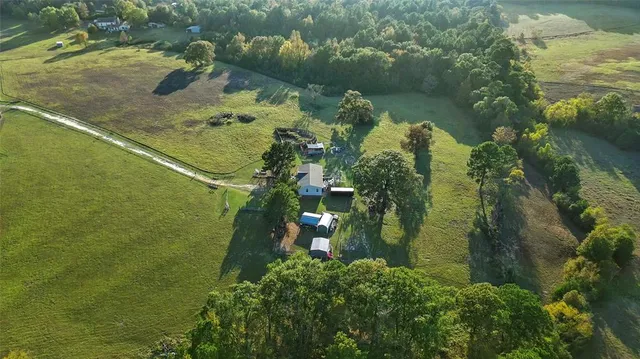 a view of a lake with a yard