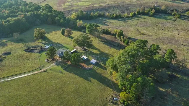 a view of a lake with a yard