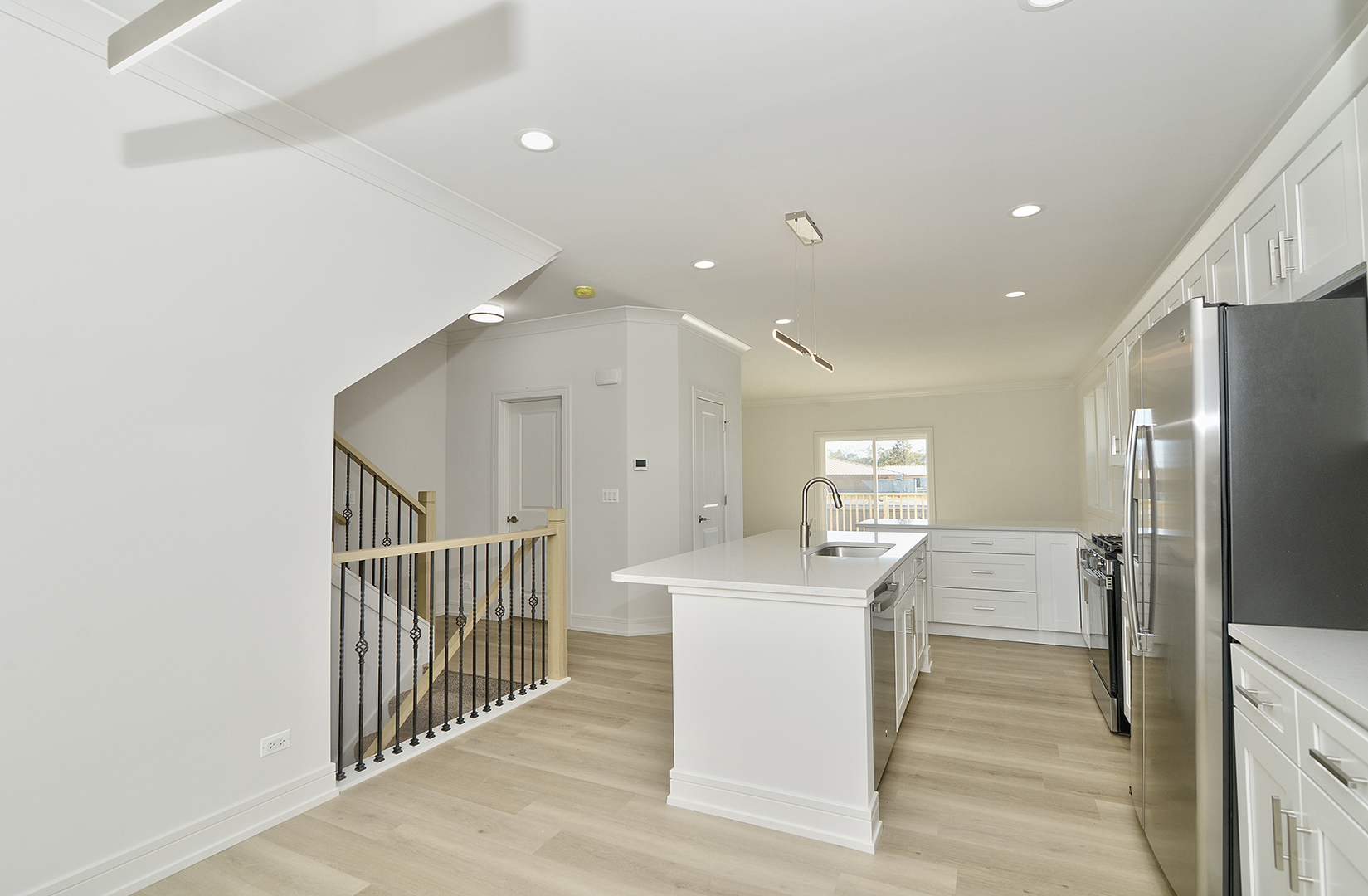 214 North Walnut Street Bensenville, IL 60106 - Photo 11 of 42 a view of a kitchen from the hallway