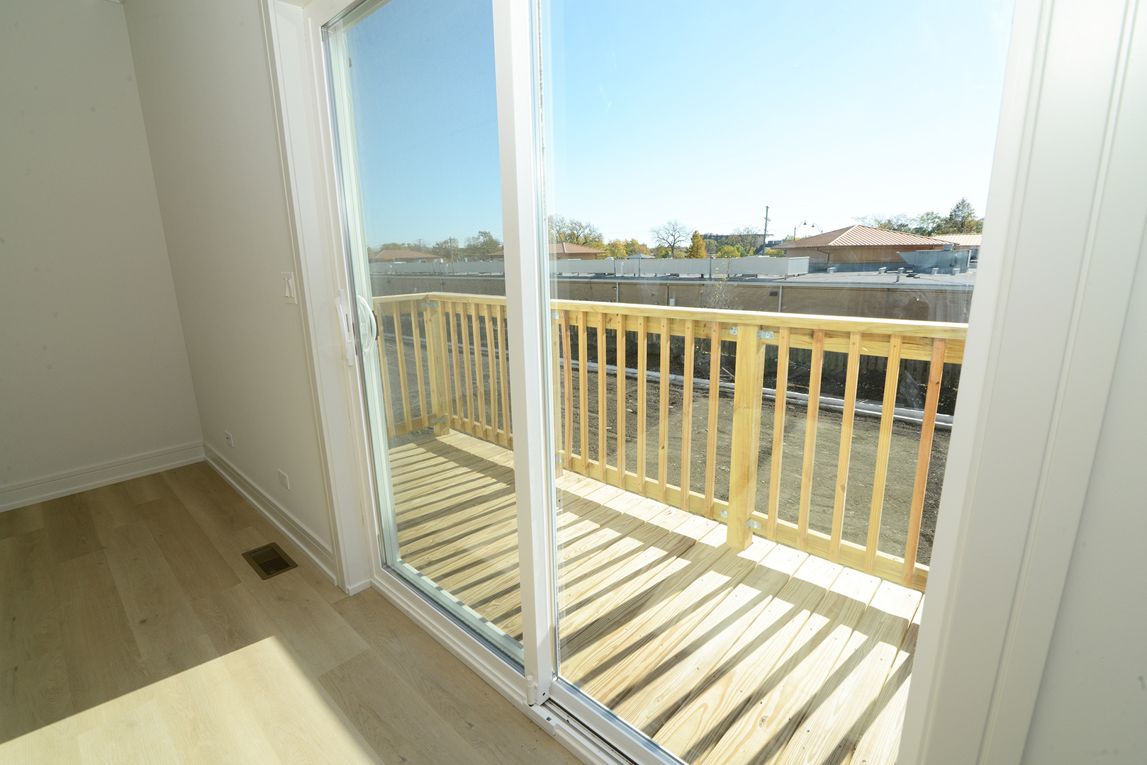 214 North Walnut Street Bensenville, IL 60106 - Photo 22 of 42 a view of a balcony with wooden floor