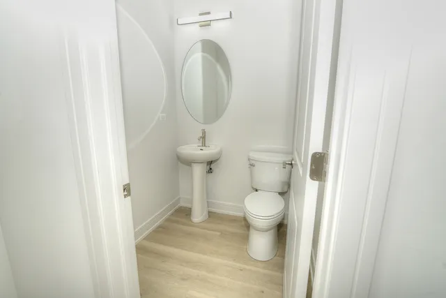 a bathroom with a toilet and a sink
