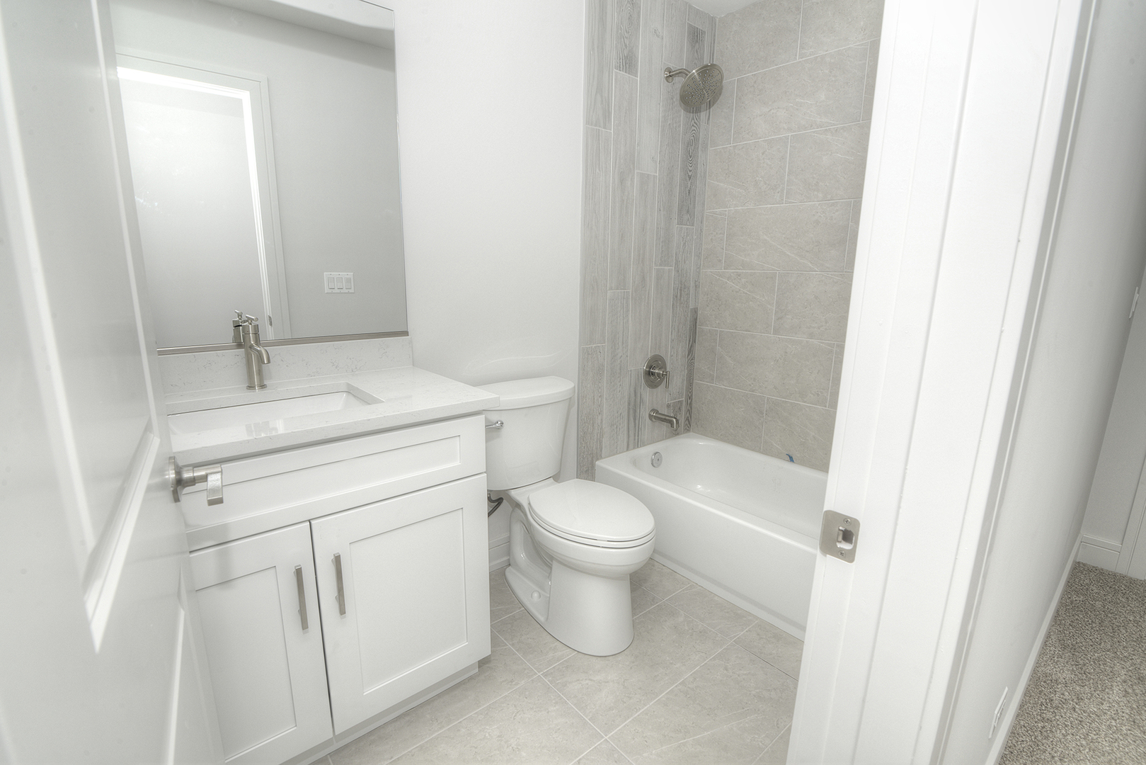 214 North Walnut Street Bensenville, IL 60106 - Photo 29 of 42 a bathroom with a sink toilet vanity and shower