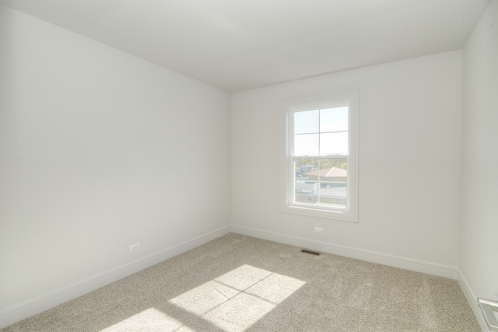 214 North Walnut Street Bensenville, IL 60106 - Photo 31 of 42 an empty room with a window