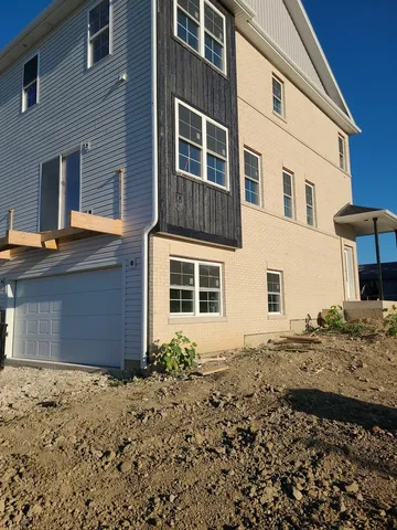 a view of kitchen and wooden floor