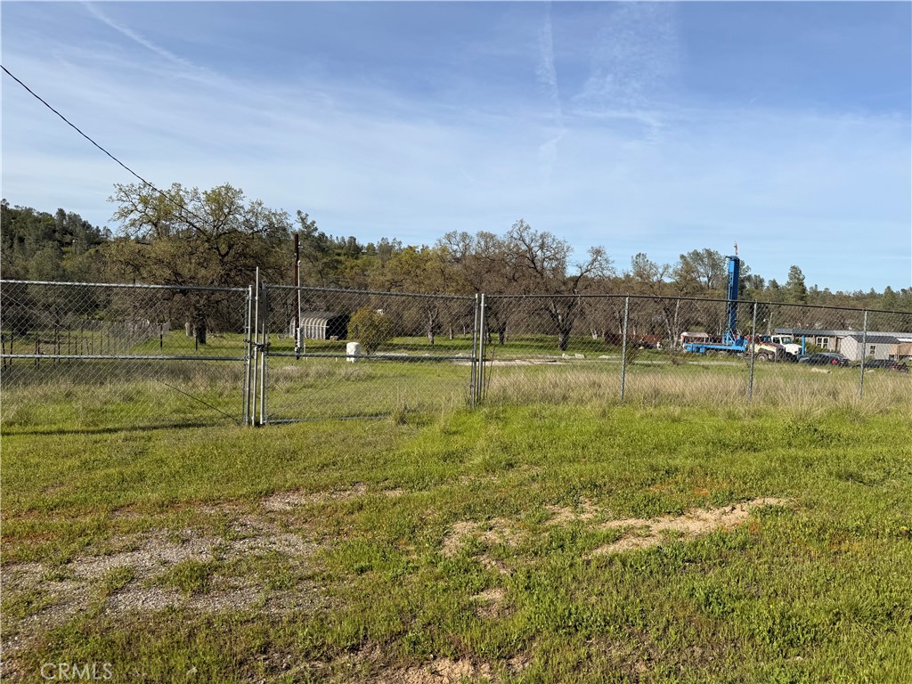 15740 Rancho Tehama Road Corning, CA 96021 - Photo 3 of 9 a view of a golf course with a lake