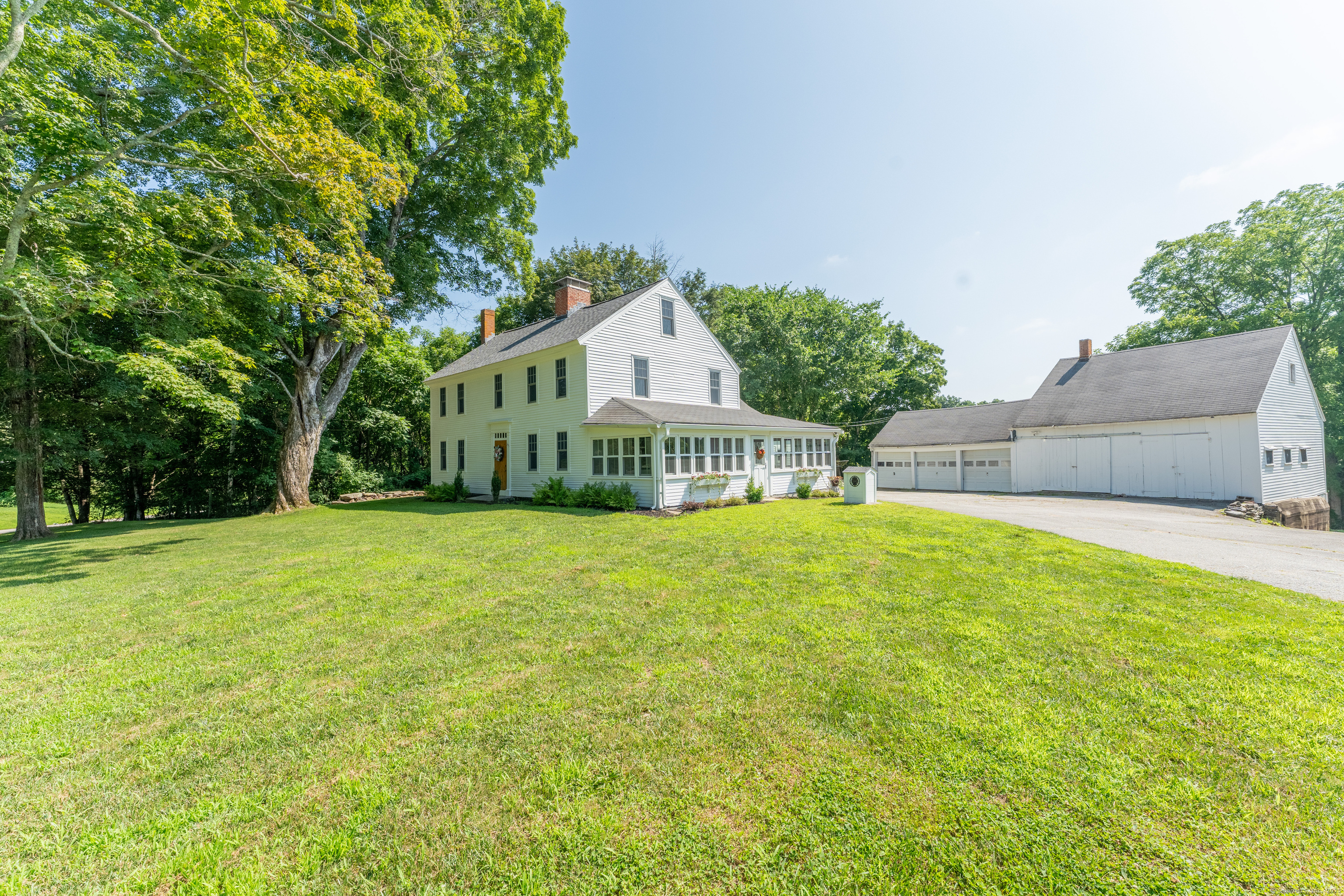 393 North Canterbury Road Canterbury, CT 06331 - Photo 3 of 40 a view of an house with backyard and garden