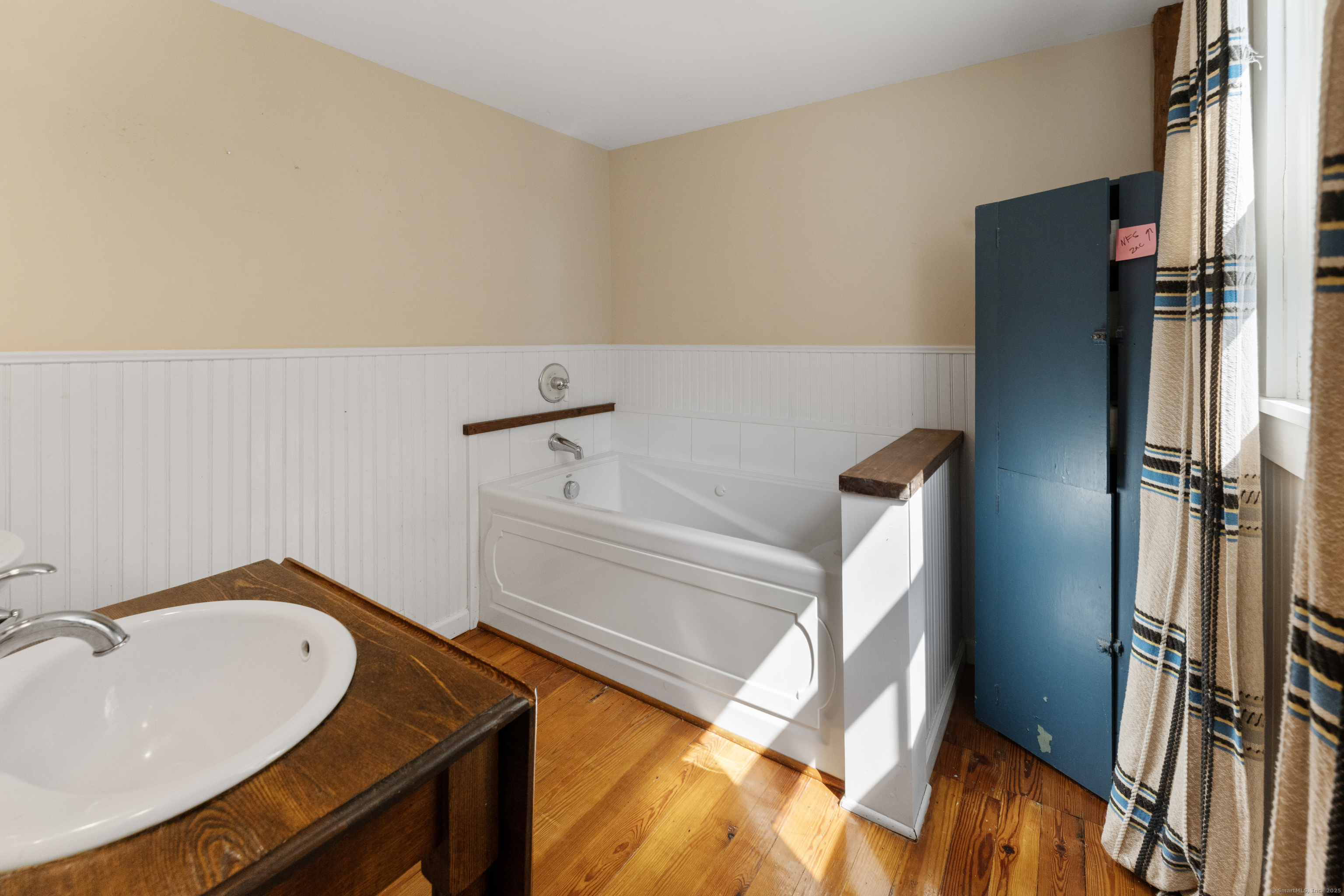 393 North Canterbury Road Canterbury, CT 06331 - Photo 32 of 40 a bathroom with a sink and a bathtub