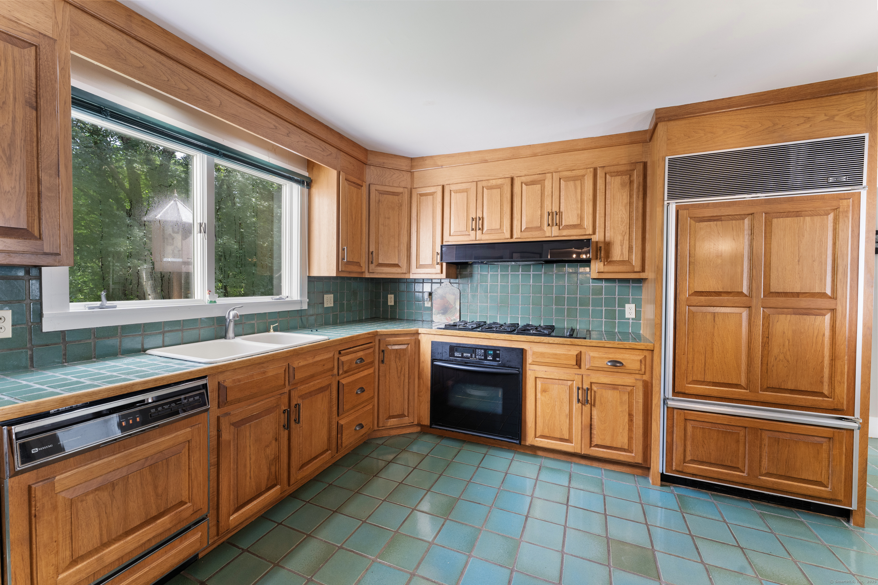 393 North Canterbury Road Canterbury, CT 06331 - Photo 10 of 40 a kitchen with stainless steel appliances granite countertop a sink and cabinets