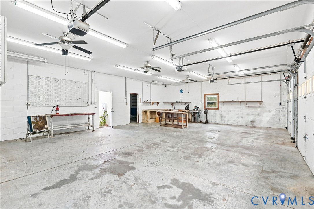 2981 Smokey Road Aylett, VA 23009 - Photo 17 of 84 Spacious garage with multiple garage doors, concre