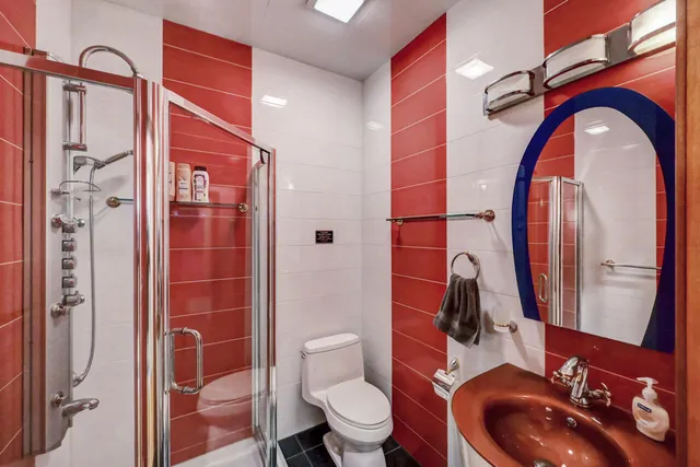 a bathroom with a bathtub and a sink