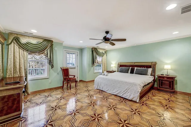 a view of a house with backyard and a tree