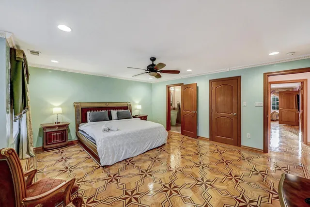 a backyard of a house with childrens swings and slides