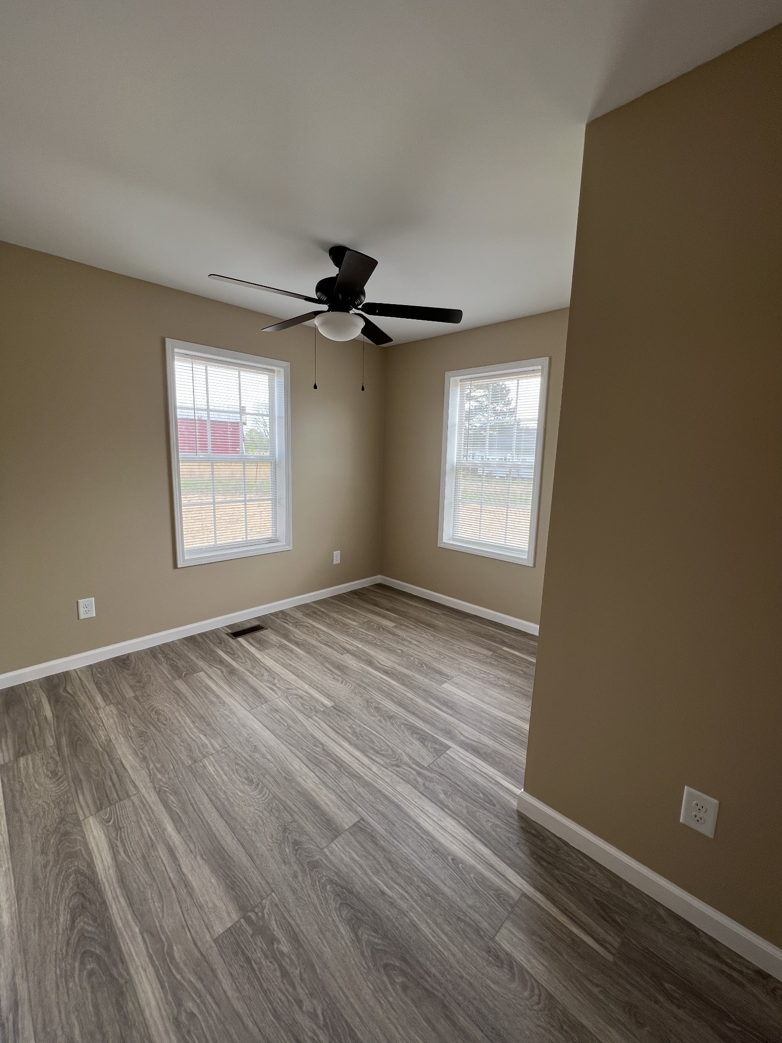 2363 Willette Road Red Boiling Springs, TN 37150 - Photo 9 of 10 wooden floor in an empty room with a window