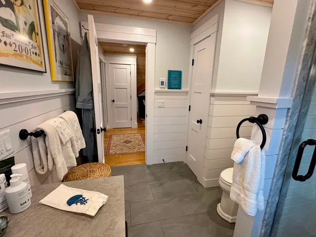 a bathroom with a sink and mirror