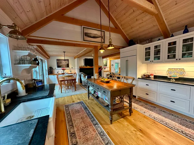 a swimming pool with outdoor seating