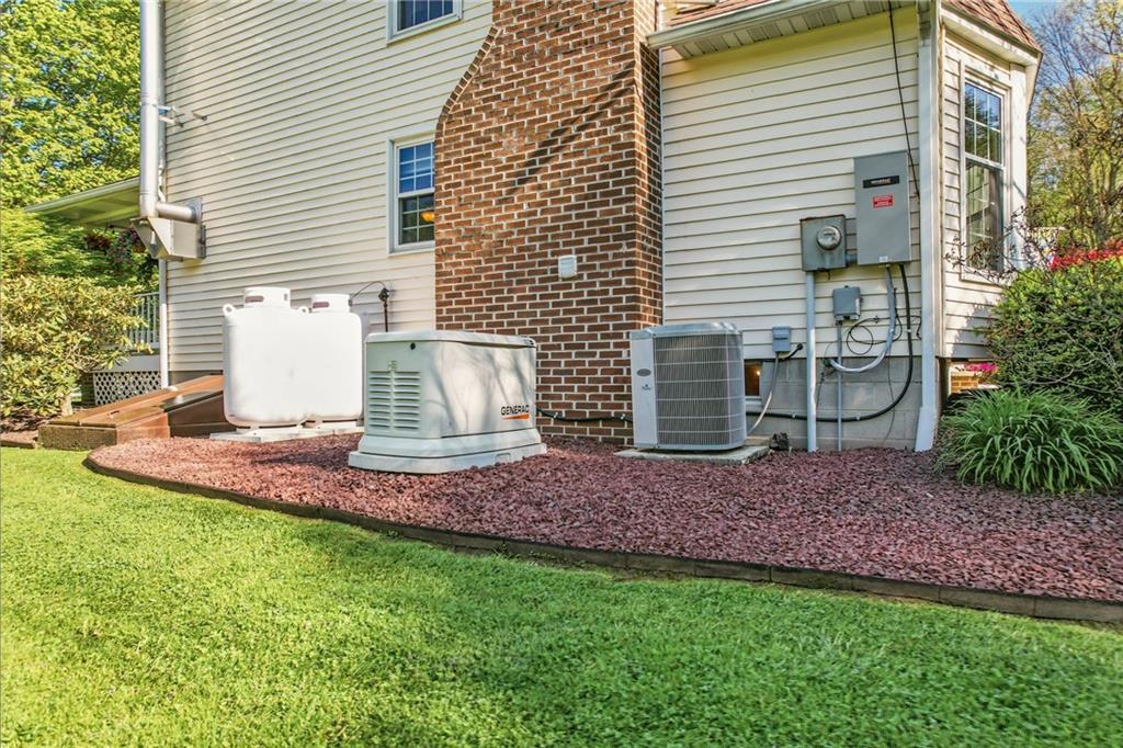 9935 Greiser Road Conneaut Lake, PA 16316 - Photo 8 of 50 a view of a backyard with plants and entertaining space