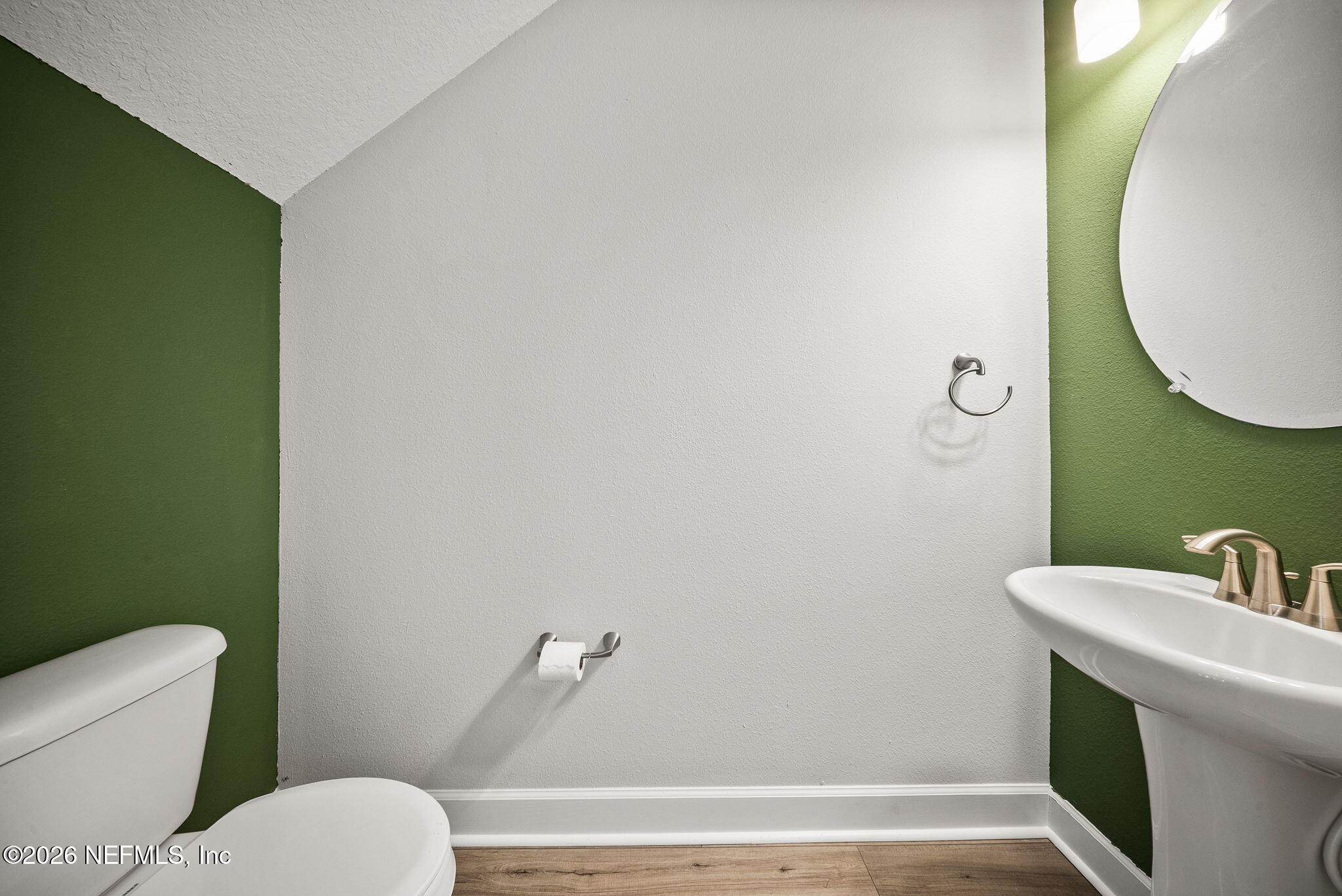 11465 Catalyst Road Jacksonville, FL 32256 - Photo 31 of 61 a bathroom with a toilet and a sink