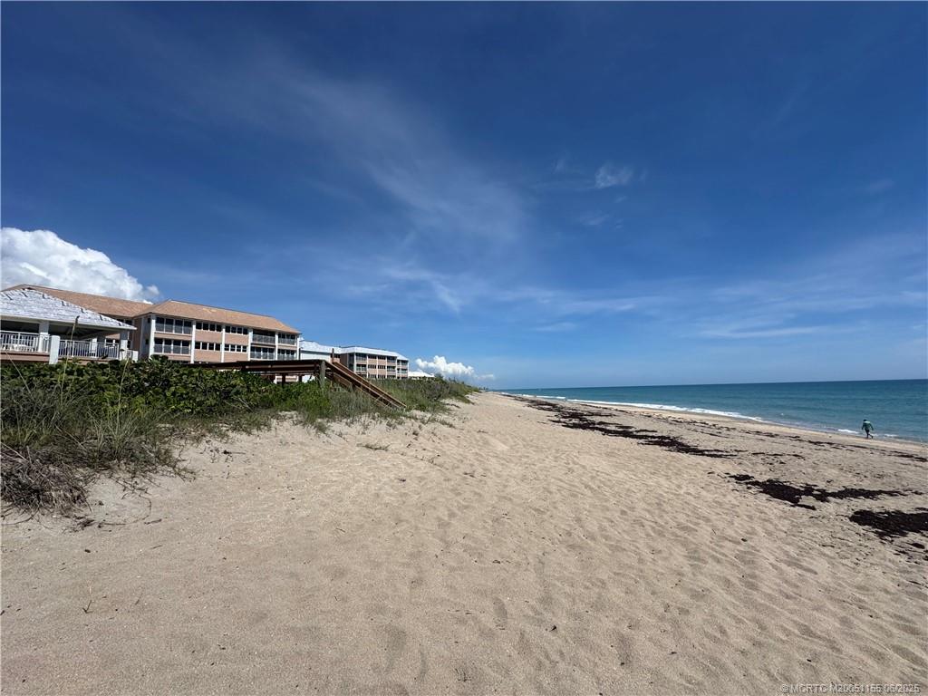 1501 Northeast Ocean Boulevard, Unit 9 Stuart, FL 34996 - Photo 39 of 41 a view of a dirt road