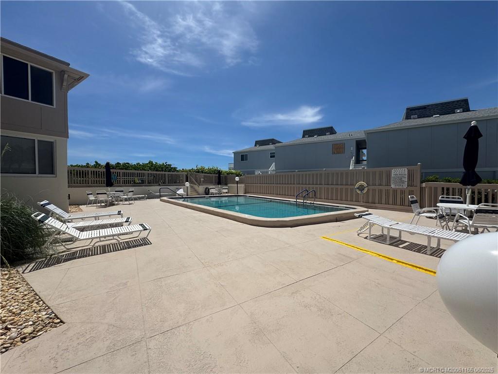 1501 Northeast Ocean Boulevard, Unit 9 Stuart, FL 34996 - Photo 41 of 41 a outdoor space with patio