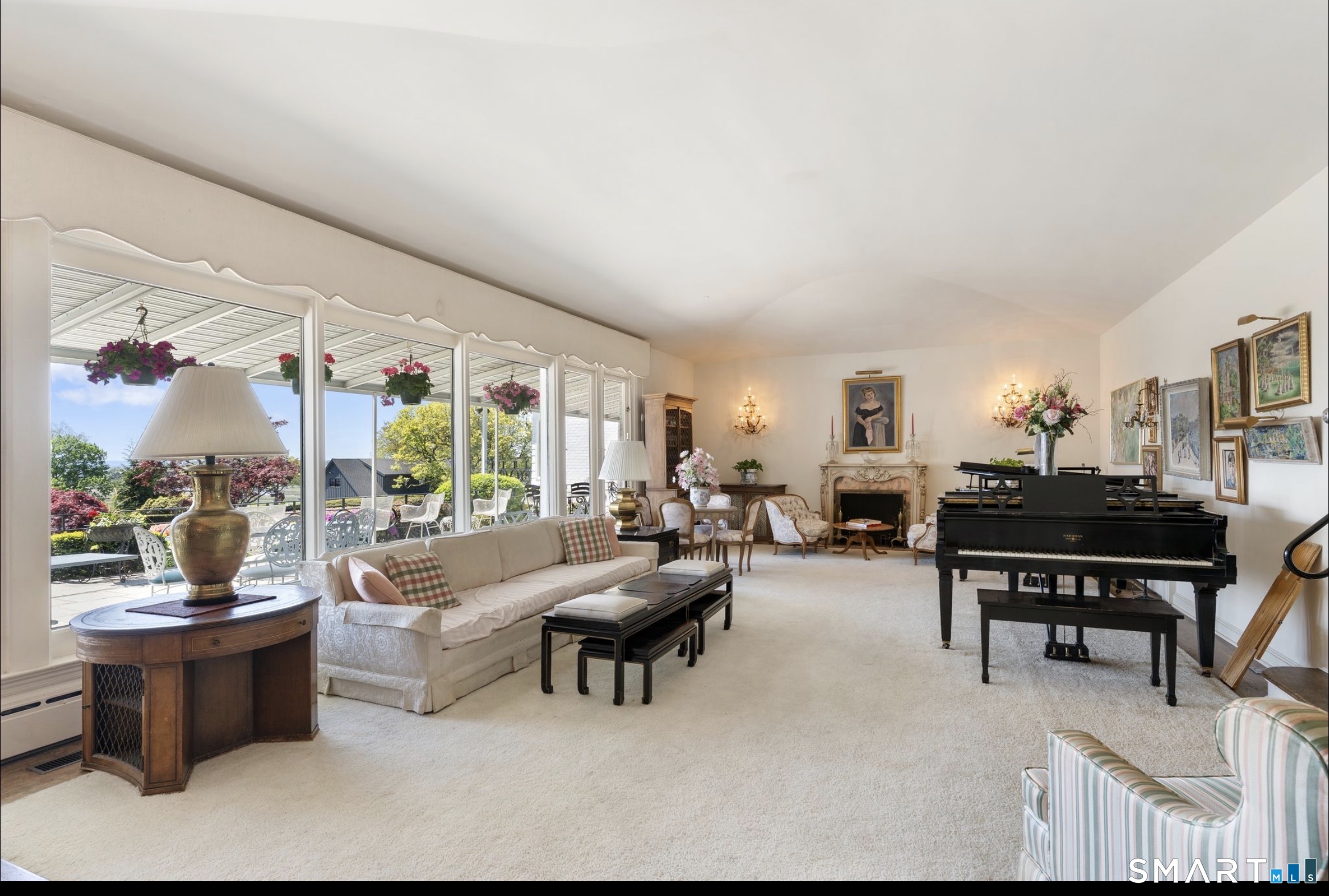 7 Sasqua Road Norwalk, CT 06855 - Photo 4 of 40 a living room with furniture and a large window
