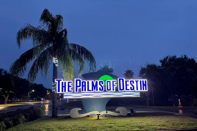 a front view of a building with sitting space