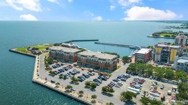a balcony with outdoor seating and entertaining space