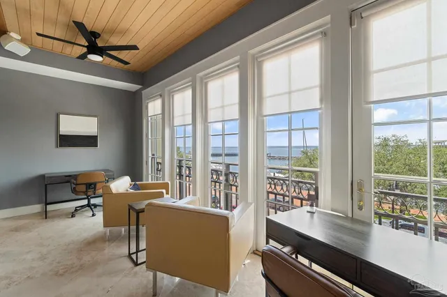 a room with furniture and a large window