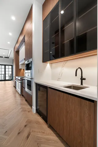 a view of a kitchen with furniture and a kitchen view